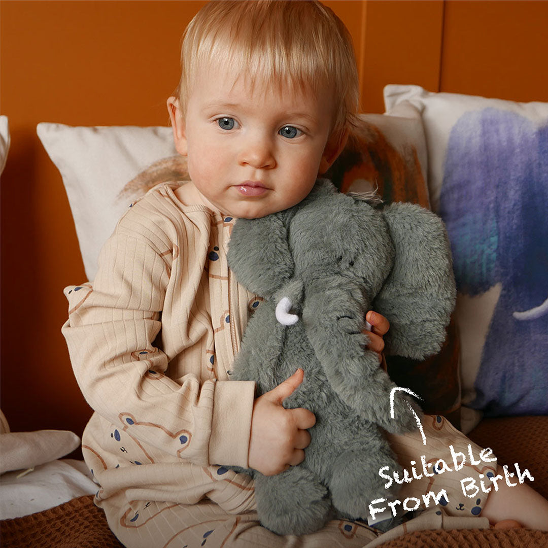 baby holding elephant soft toy - suitable from birth